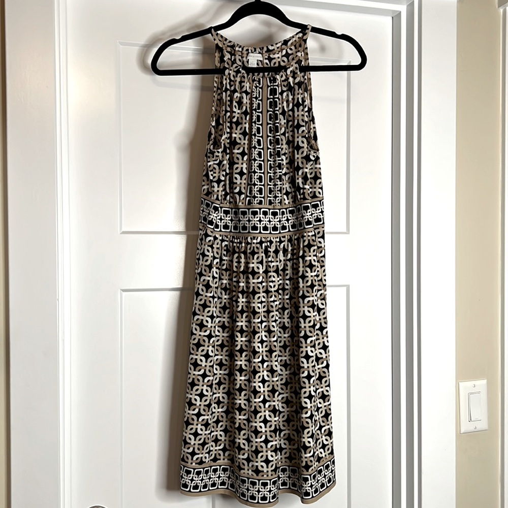 Knee length, lightweight dress. Beige and black with a pattern  Size M